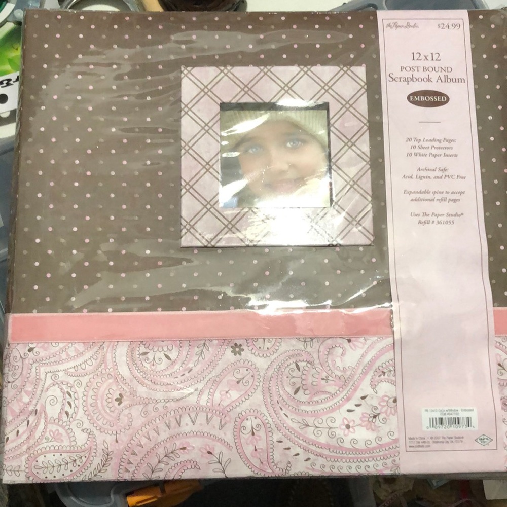 Brand new scrap book and 2 extra packs of pages